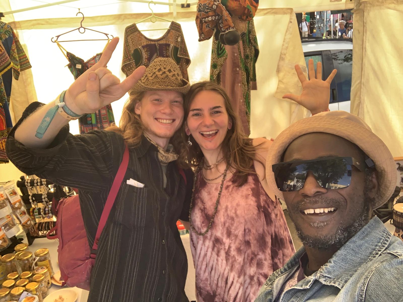 Group selfie of the TogoSunny team and a customer inside the tent